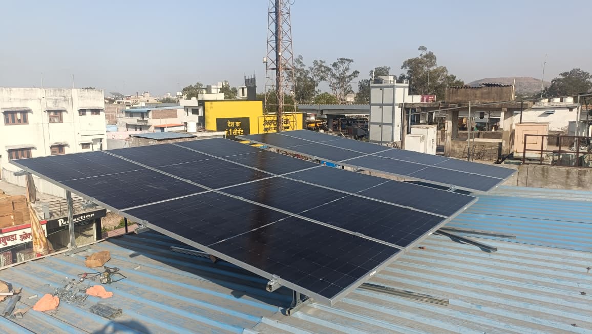 Modern luxury villa with infinity pool overlooking ocean, floor-to-ceiling windows, and contemporary architecture